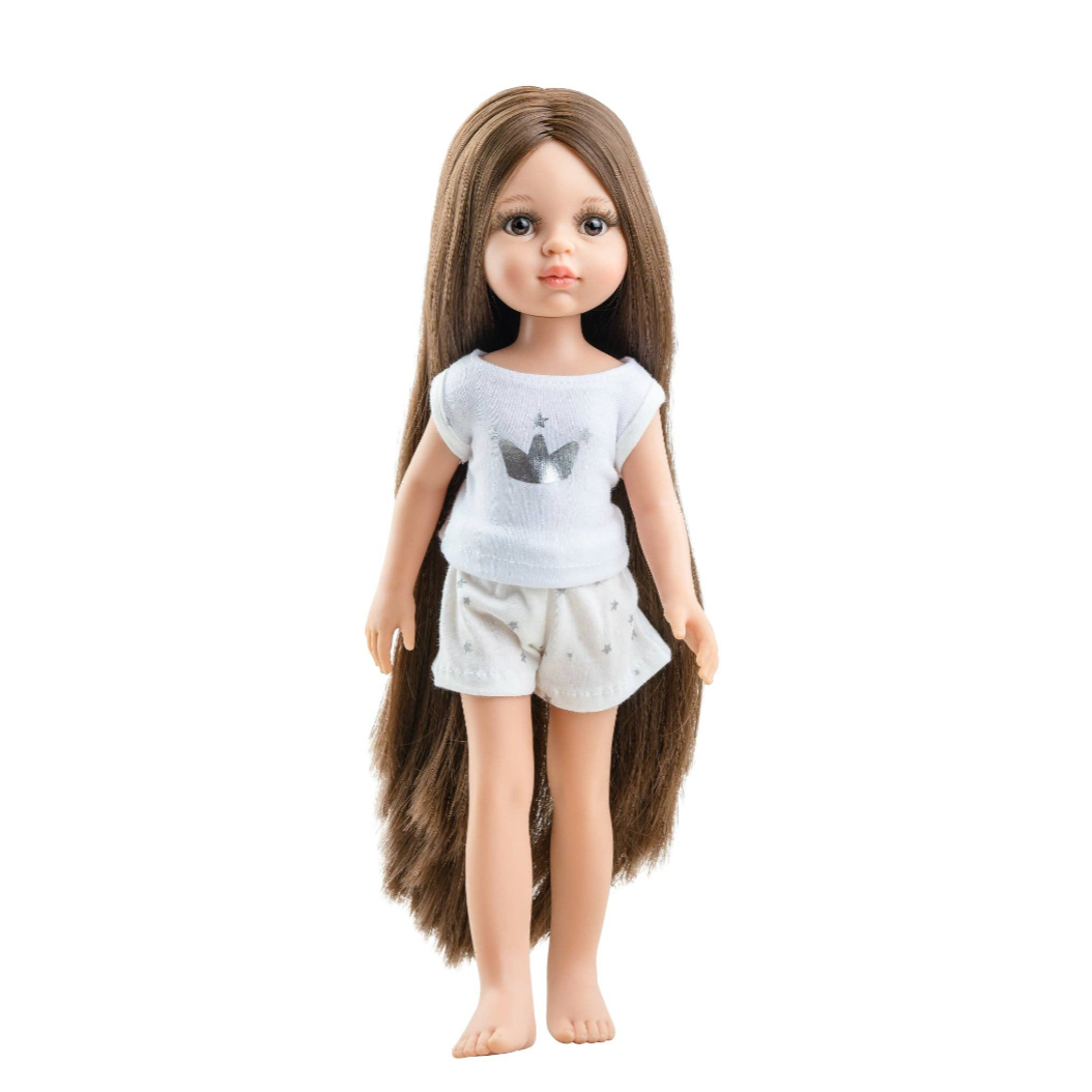 A doll with long brown hair wearing a white t-shirt with a gray graphic and white shorts, standing against a white background.