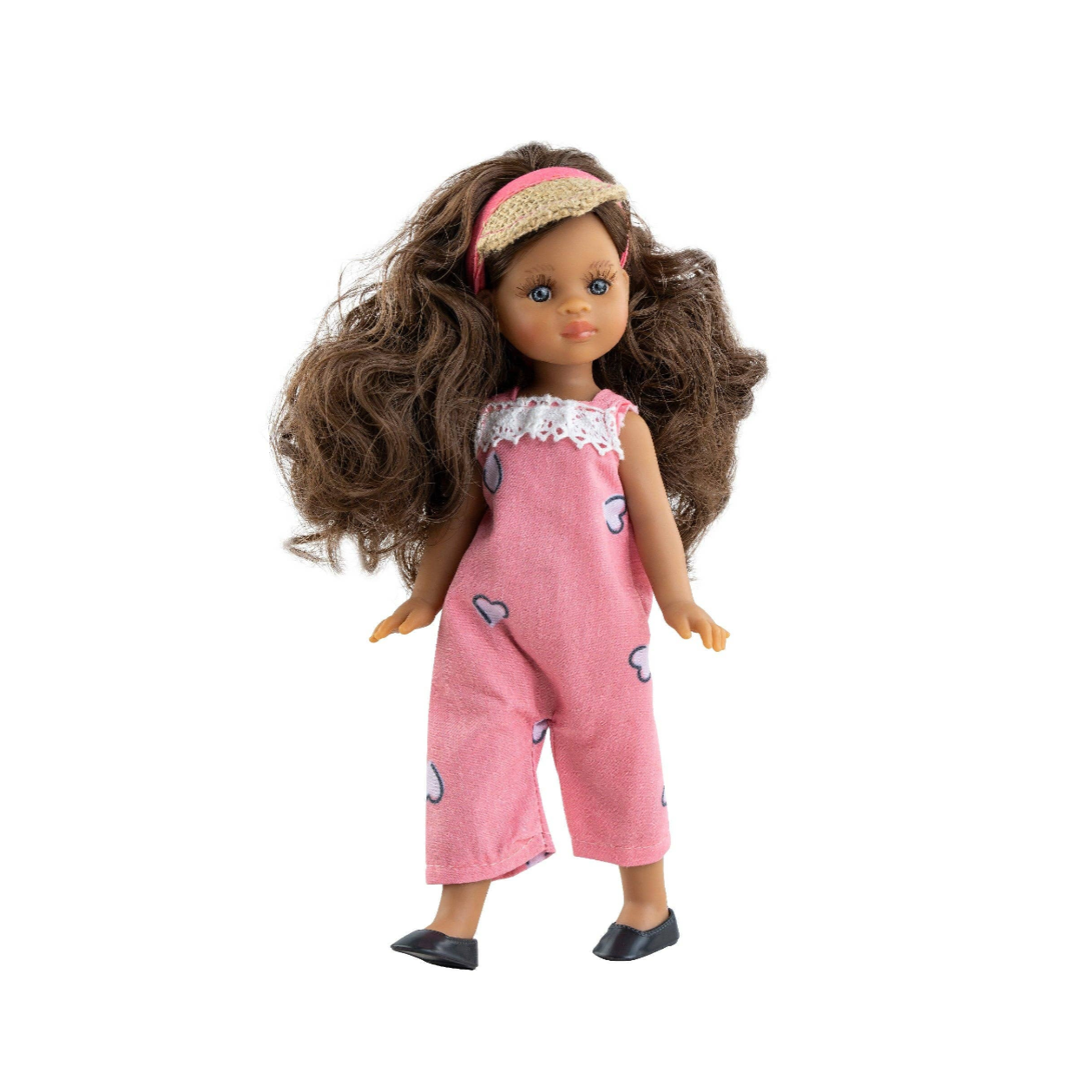 A doll with long brown curly hair wearing a pink sleeveless jumpsuit with small white bunny prints, a pink headband, and black shoes, shown against a white background.