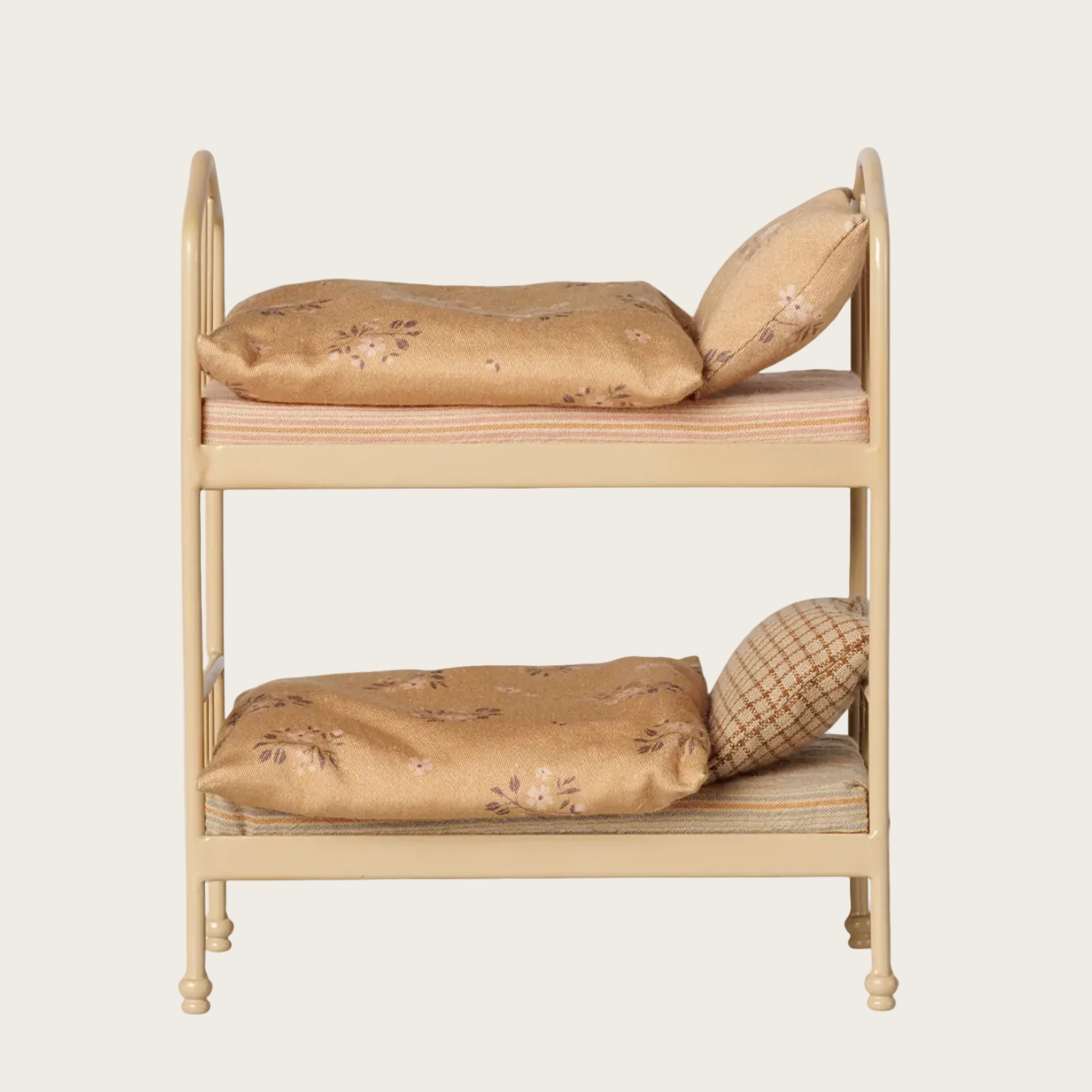 A screenshot of a furniture product page showing a two-tier wooden bunk bed with floral-patterned bedding. The page includes the 'Maileg Wholesale' logo, product details, and a shopping cart icon at the top right.