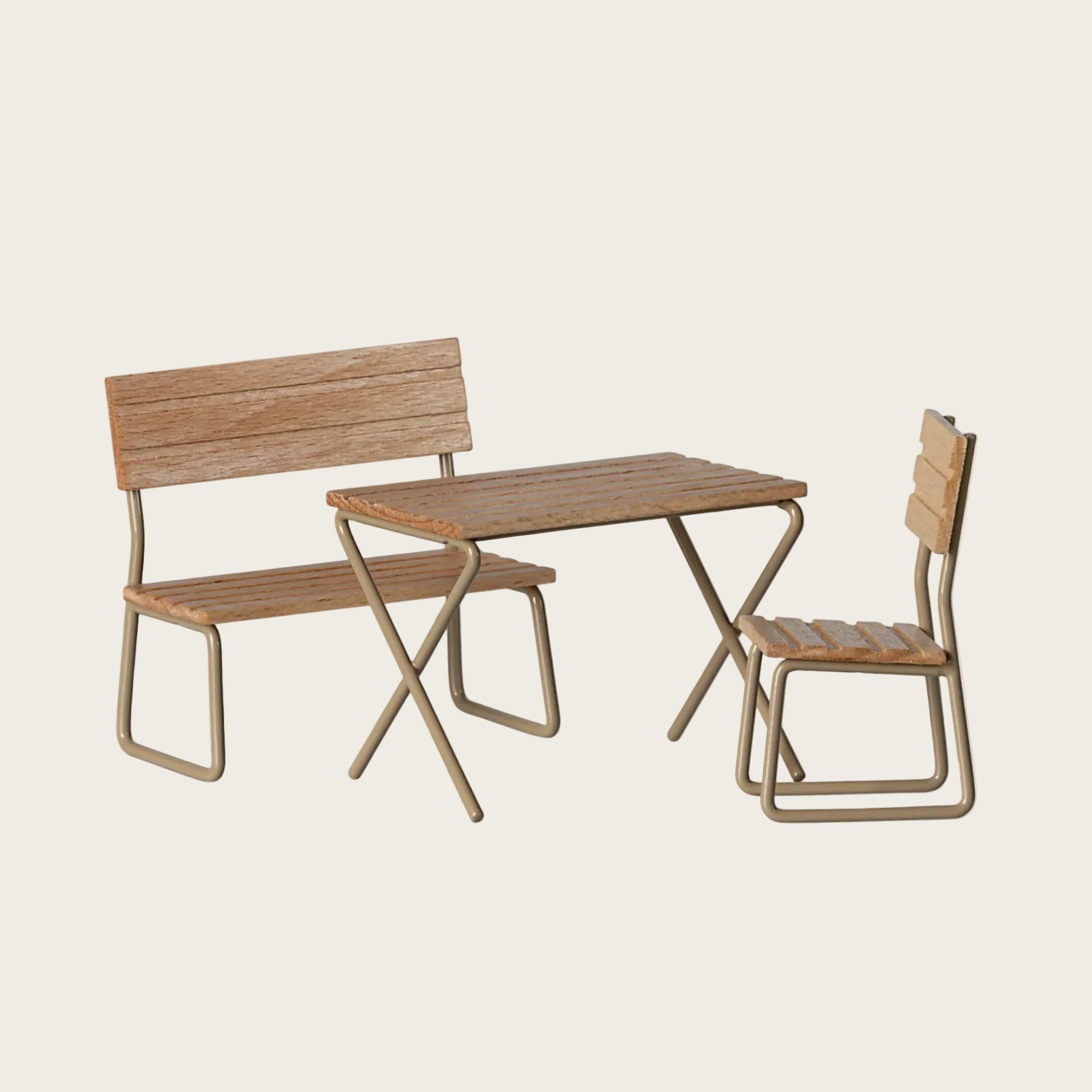 A wooden garden set consisting of a bench, a chair, and a folding table, shown on a minimalist e-commerce website page. The set features light brown wood slats and light beige metal frames.
