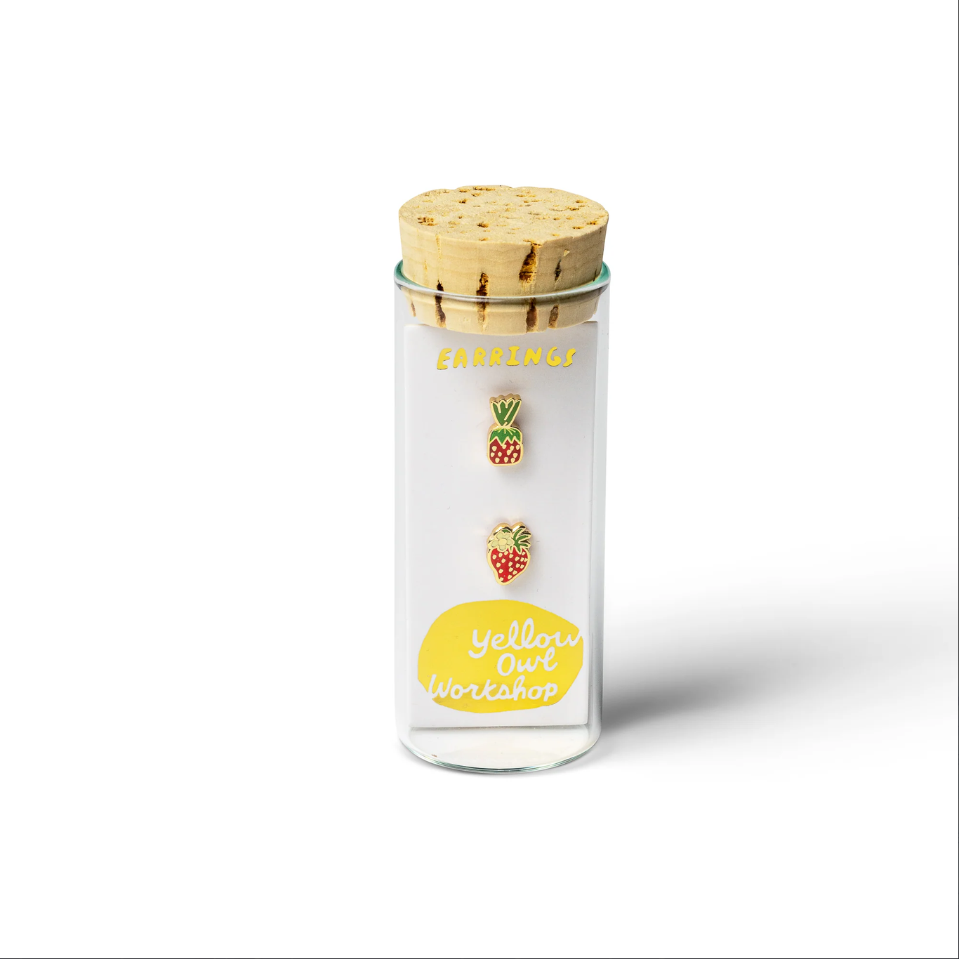 Glass jar with wooden lid containing three pins, labeled 'Yellow Owl Workshop', on a white background.