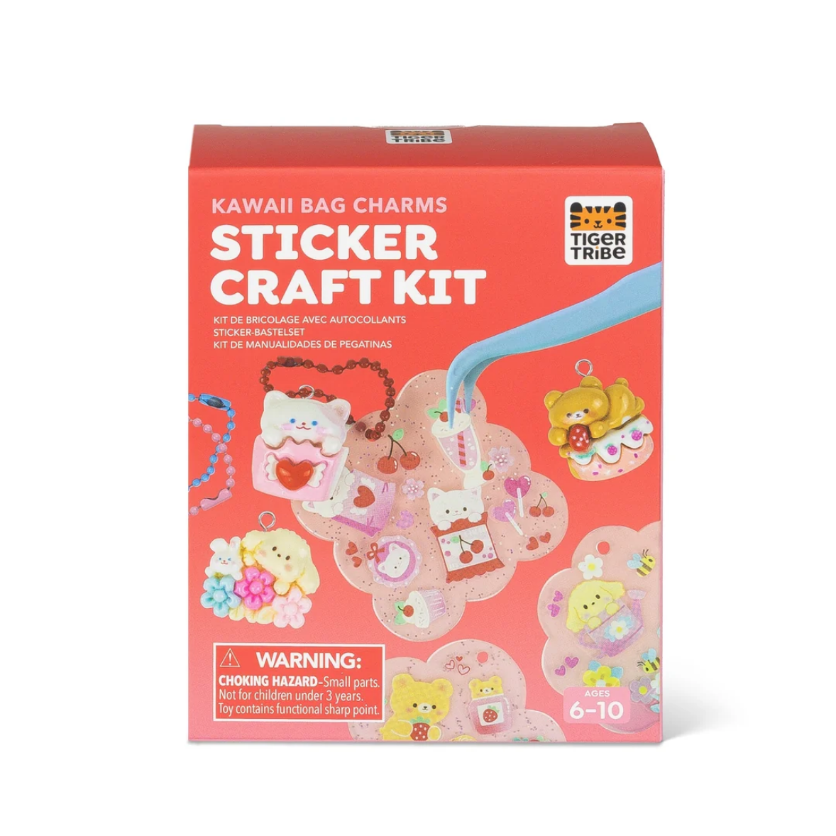 Tiger Tribe Kawaii Bag Charms Sticker Craft Kit in a coral pink box, featuring cute character charms and accessories illustrated on the front.