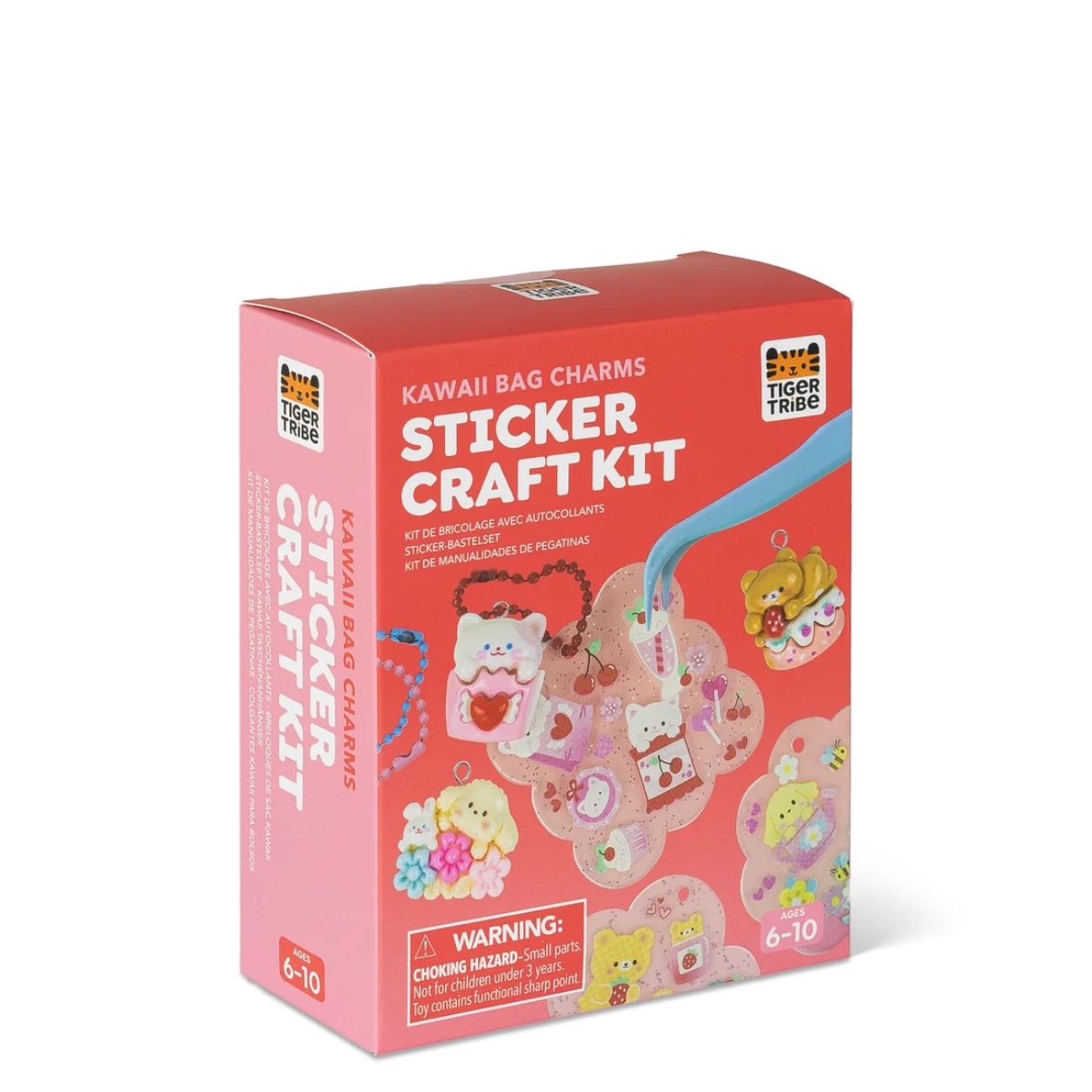 A pink and coral box for the Kawaii Tiger Tribe Sticker Craft Kit, featuring illustrations of cute tiger-themed charms and beads on the front, photographed on a clean white background.