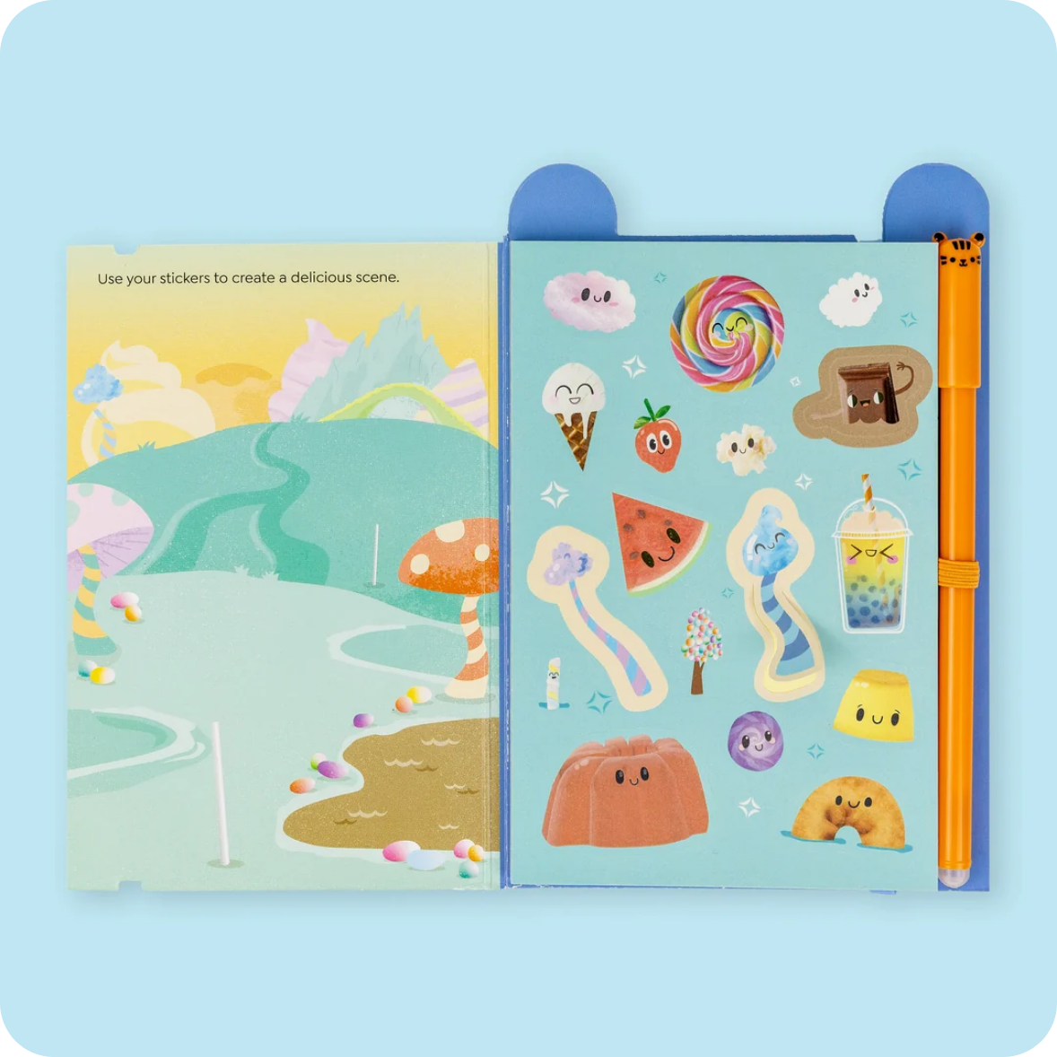 A children's sticker activity book shown open on a light blue background. The left page shows a whimsical illustrated landscape with mushrooms, hills, and a flag, with the text 'Use your stickers to create a delicious scene.