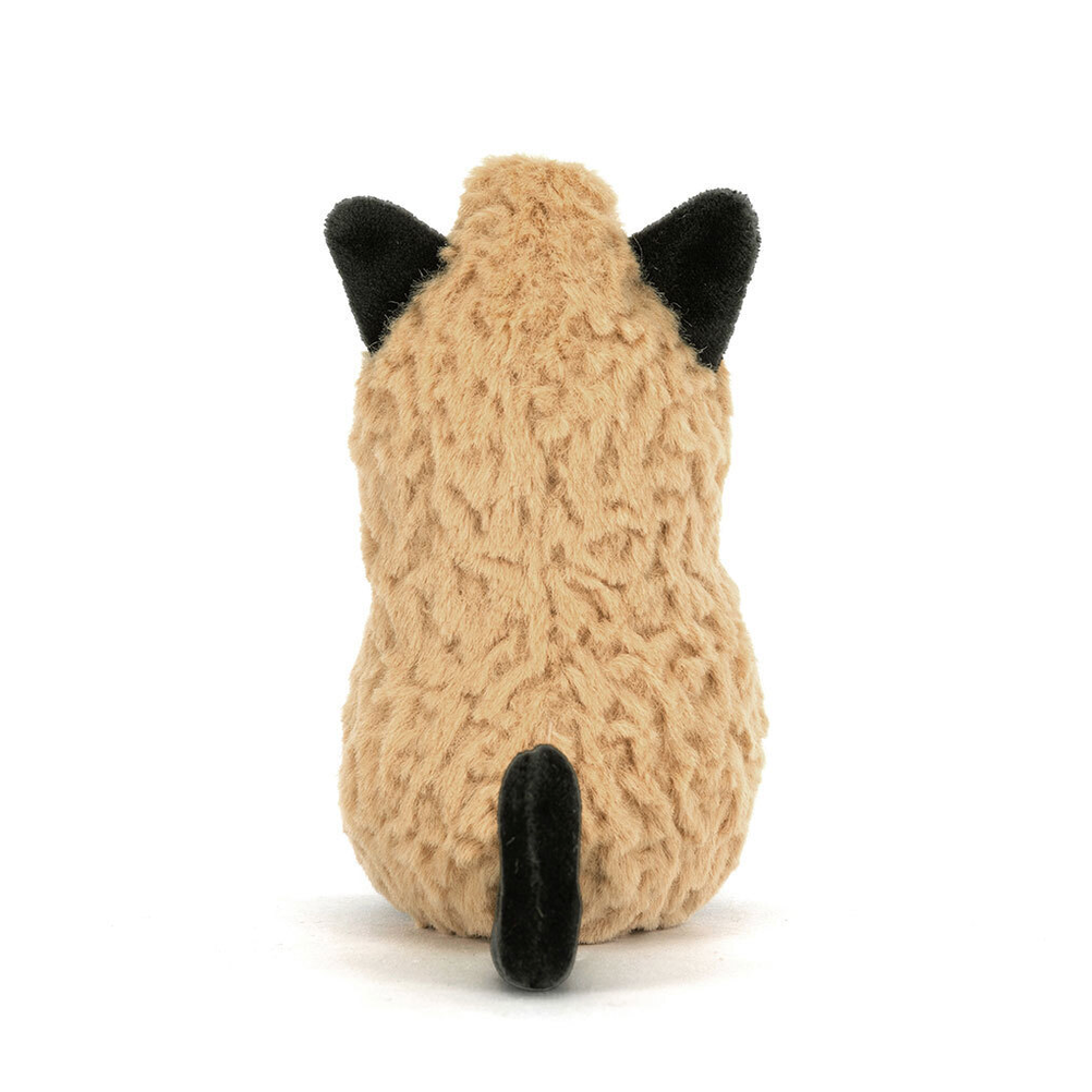 A small plush toy shaped like a sheep viewed from the back, with a textured tan body, black ears, and a black tail, centered on a plain white background.