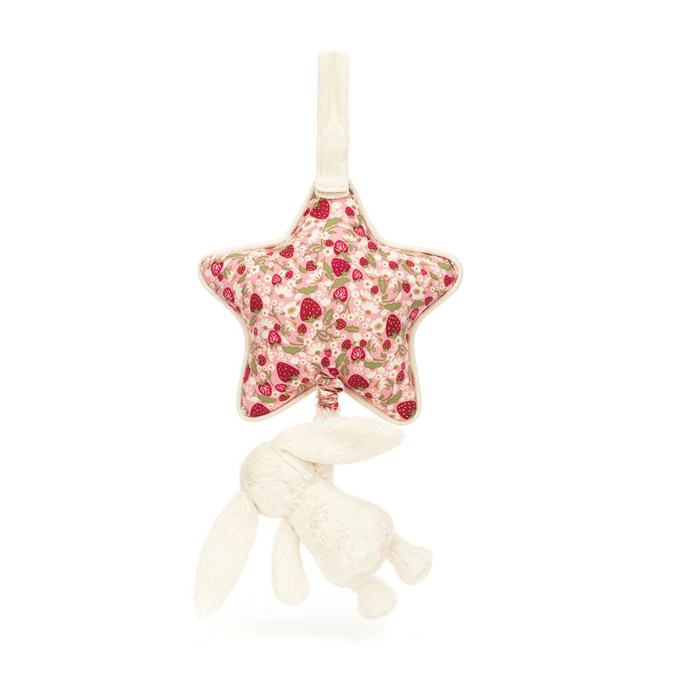 A baby hanging toy featuring a star-shaped plush top with a pink and red floral pattern, connected to a cream-colored bunny plush below, suspended from a cream ribbon on a white background.