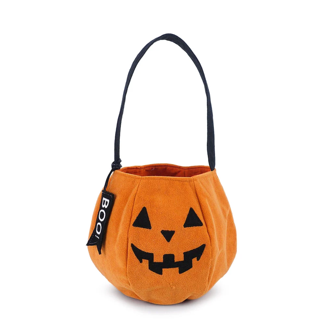 An orange plush pumpkin bucket Halloween treat bag with a black handle and a black jack-o'-lantern face.