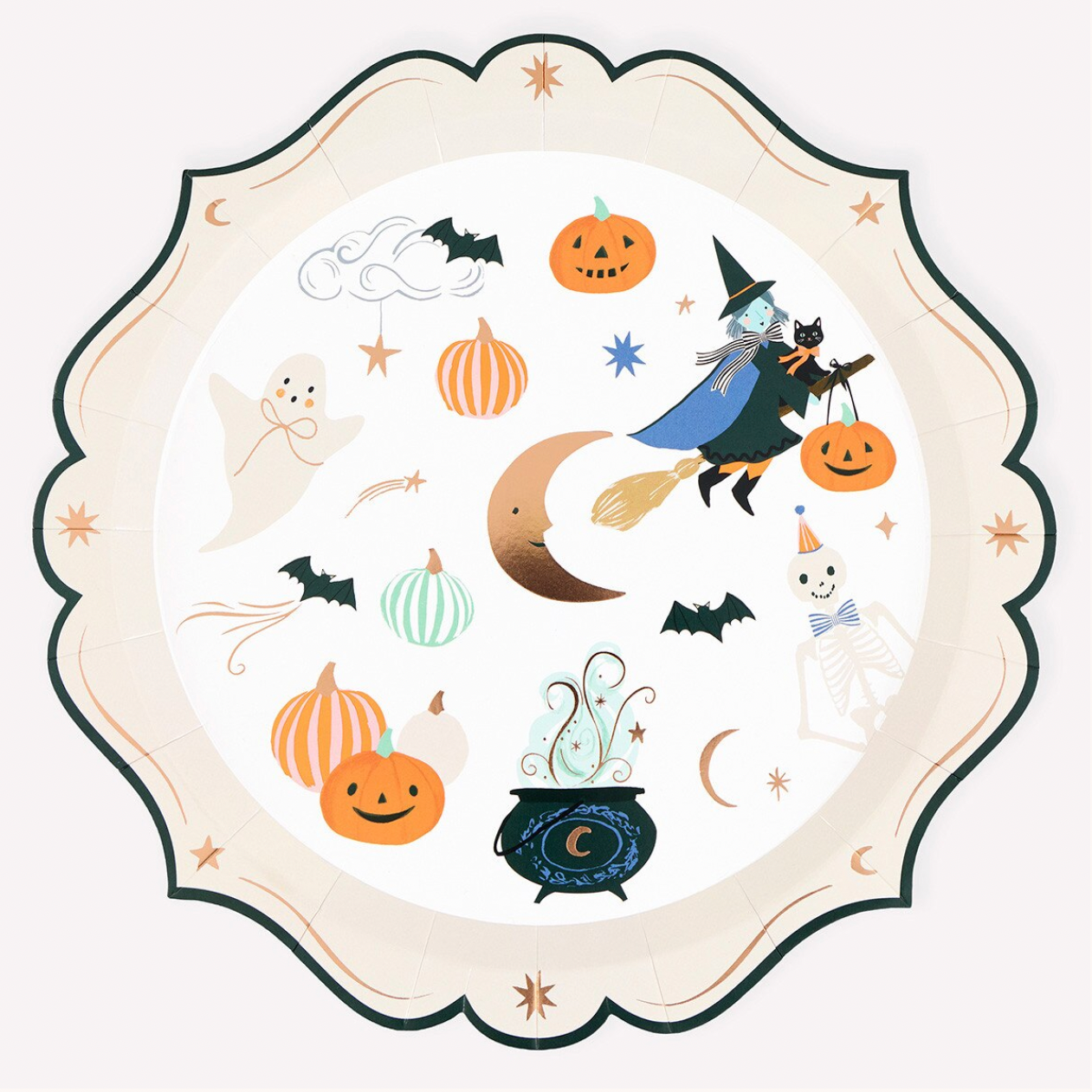 A round paper plate with an off-white background and scalloped edges, decorated with a Halloween illustration featuring a witch on a broom, pumpkins, bats, a cauldron, a ghost, and a skeleton.