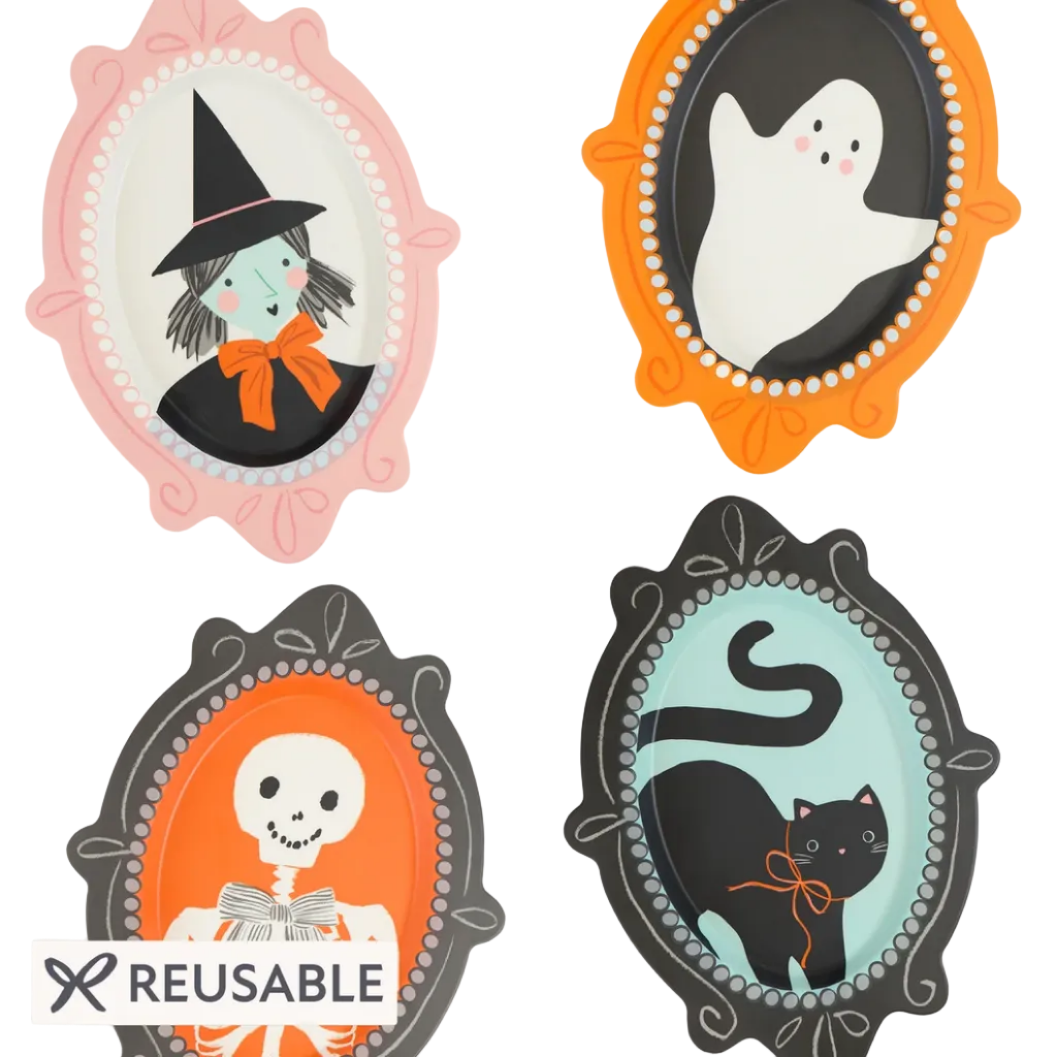 Set of Halloween-themed plates with ghost, witch, skeleton, and black cat designs in decorative frames.