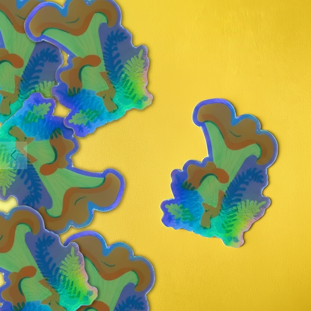 Several die-cut stickers with an abstract, layered design in green, blue, purple, and brown are arranged on a bright yellow background. One sticker is isolated on the right, and a small white navigation arrow overlay appears at the right edge.