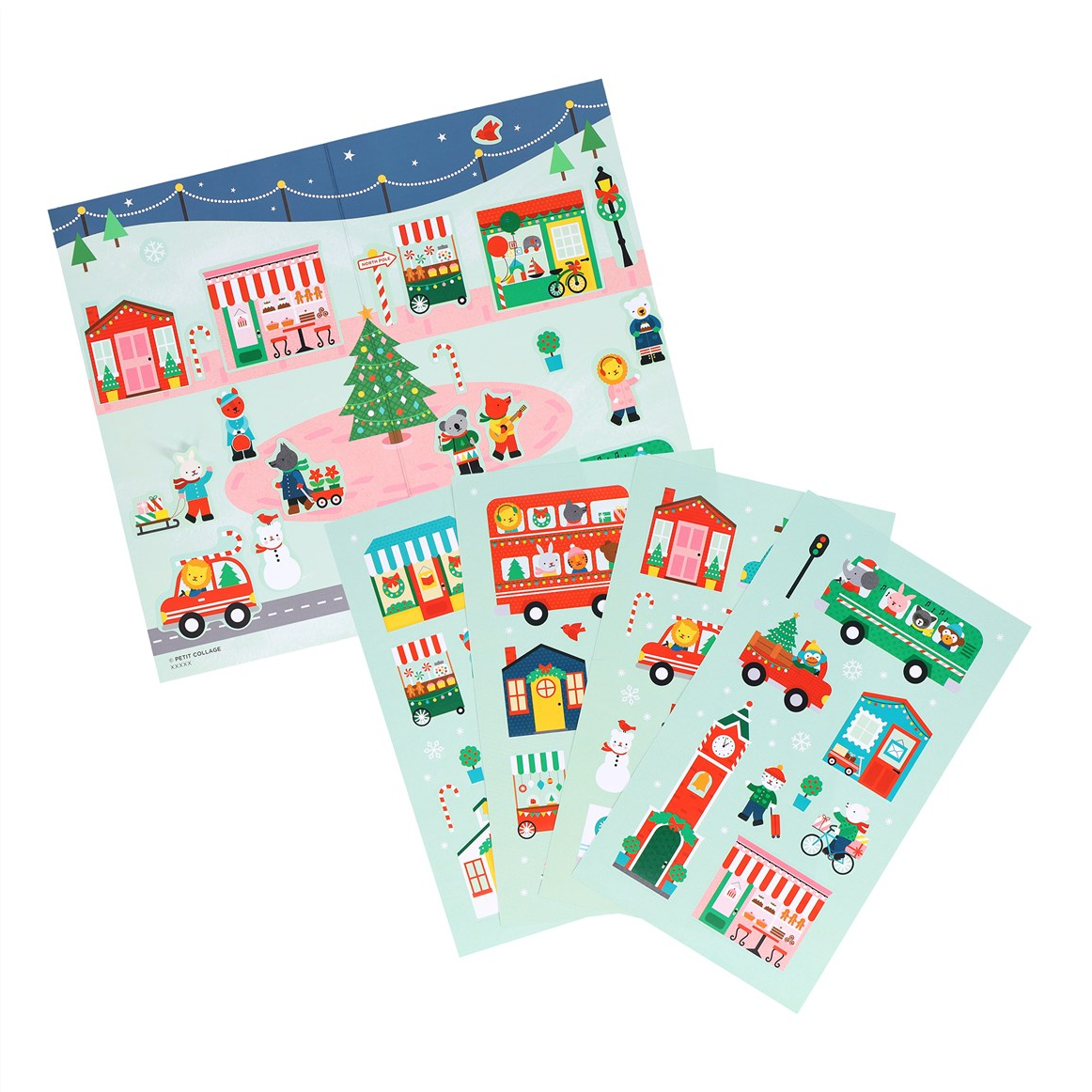 Three sheets of colorful Christmas-themed stickers fanned out on a white background, featuring festive illustrations like a Christmas tree, snowman, buses, cars, and storefronts.