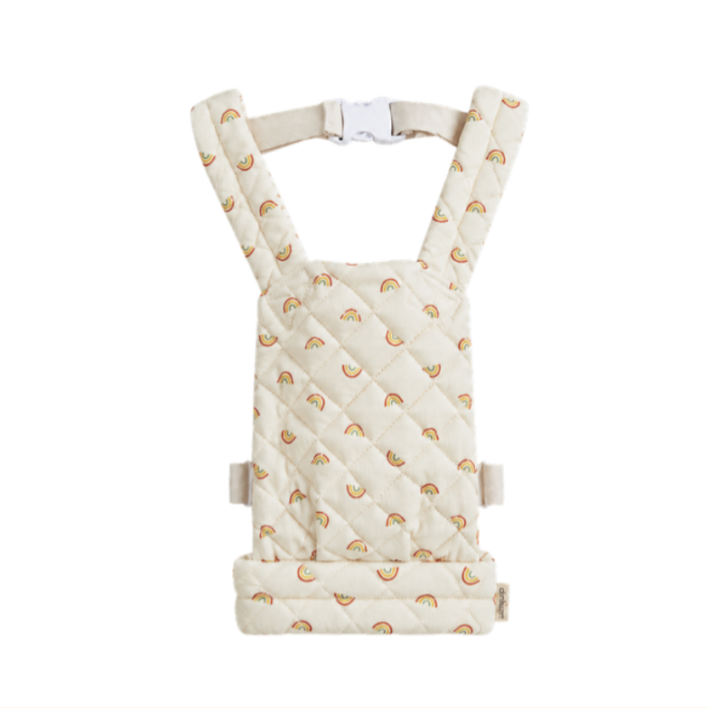 A quilted baby hip seat carrier with a diamond-stitched pattern and a small rainbow print, shown against a plain white background.