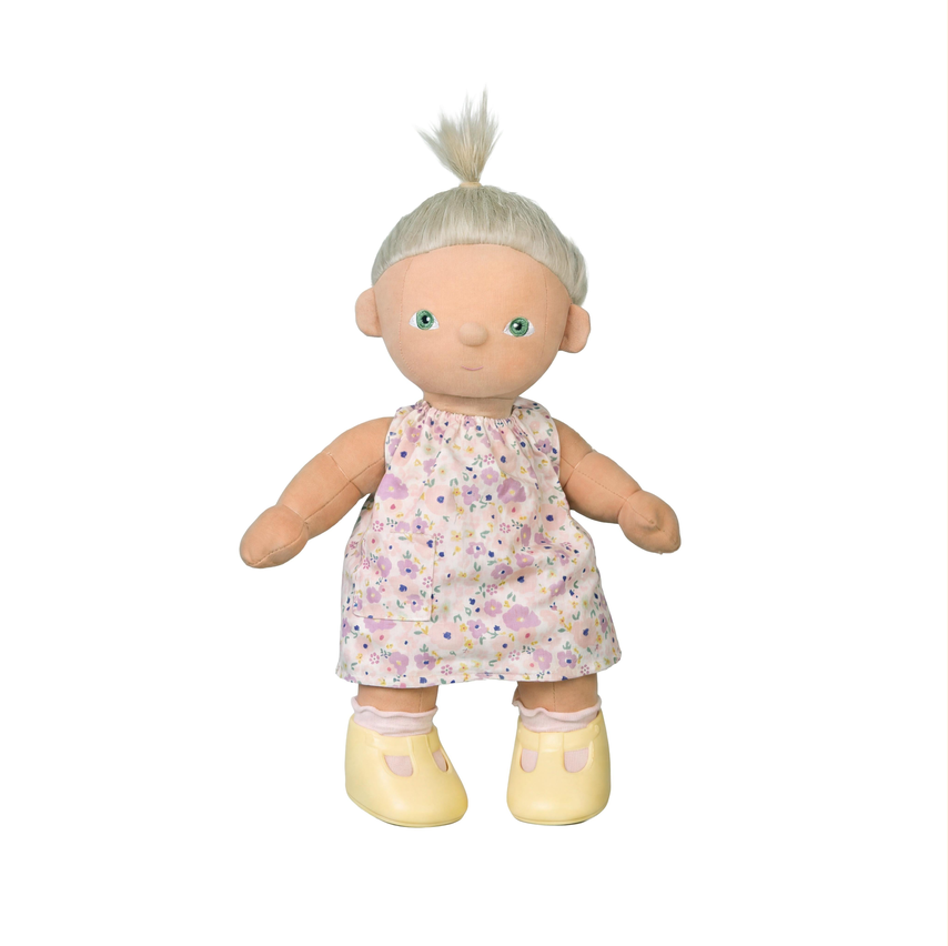 Plush doll with a floral dress on a white background