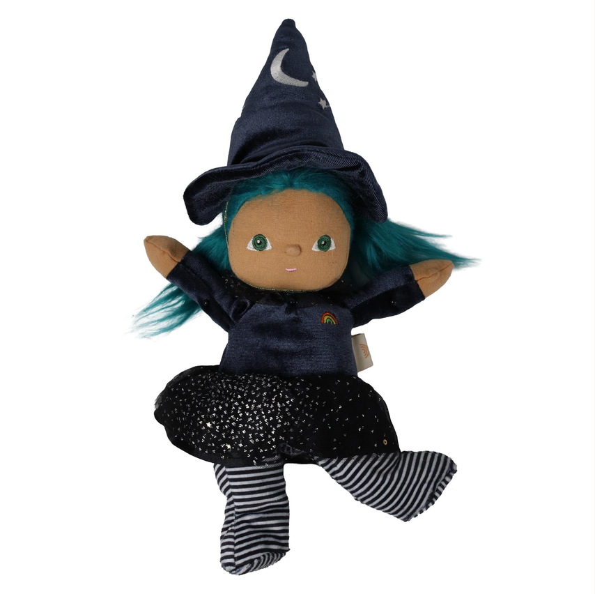 A plush witch doll with brown skin, green eyes, and bright teal hair, wearing a dark navy pointed hat with a white crescent moon, a dark navy top, a black glittery skirt, and black-and-white striped socks, isolated on a white background.