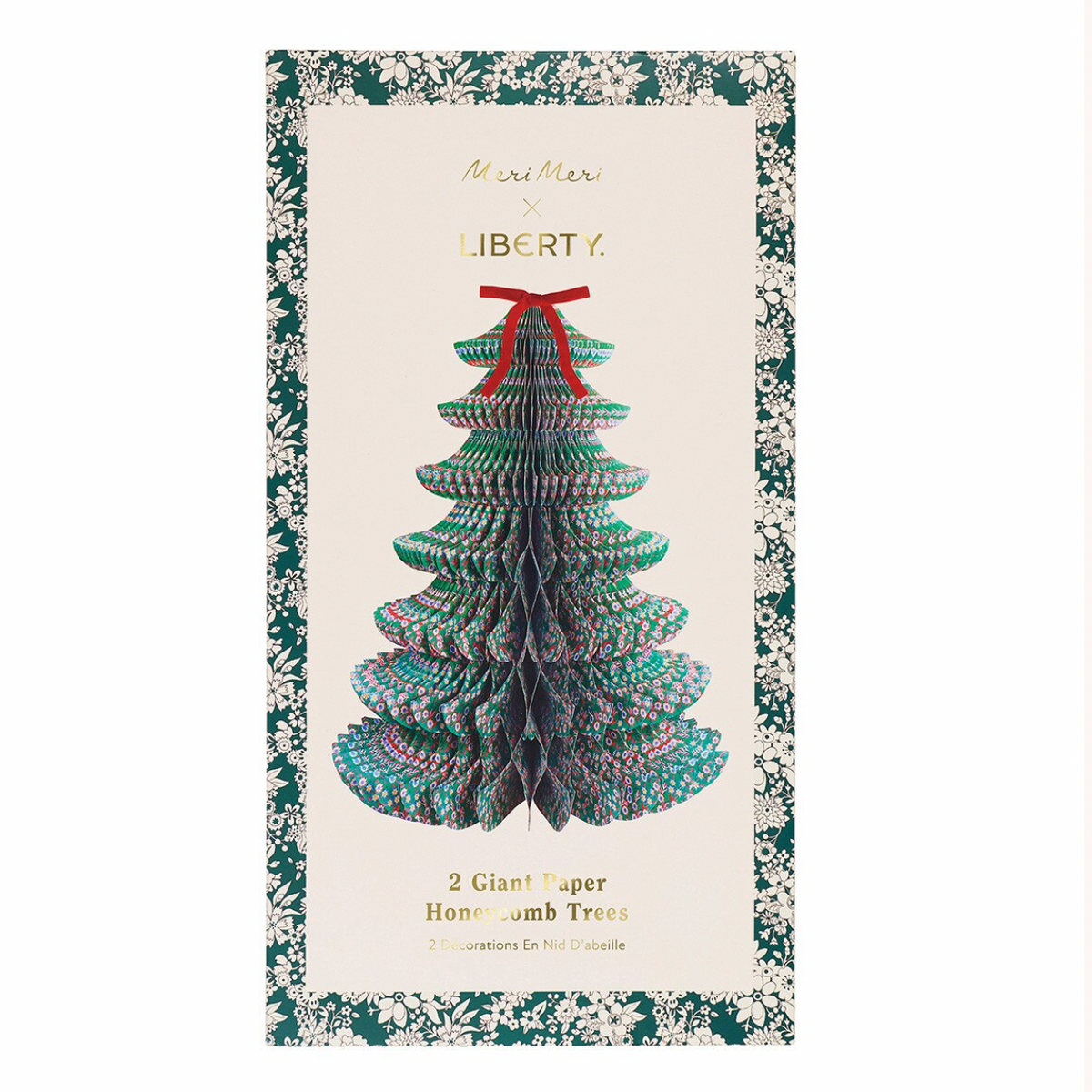 A Christmas-themed honeycomb tree candle packaging card featuring a large 3D paper honeycomb Christmas tree with teal, green, and purple layers and a red ribbon bow, on a cream background with a floral border.