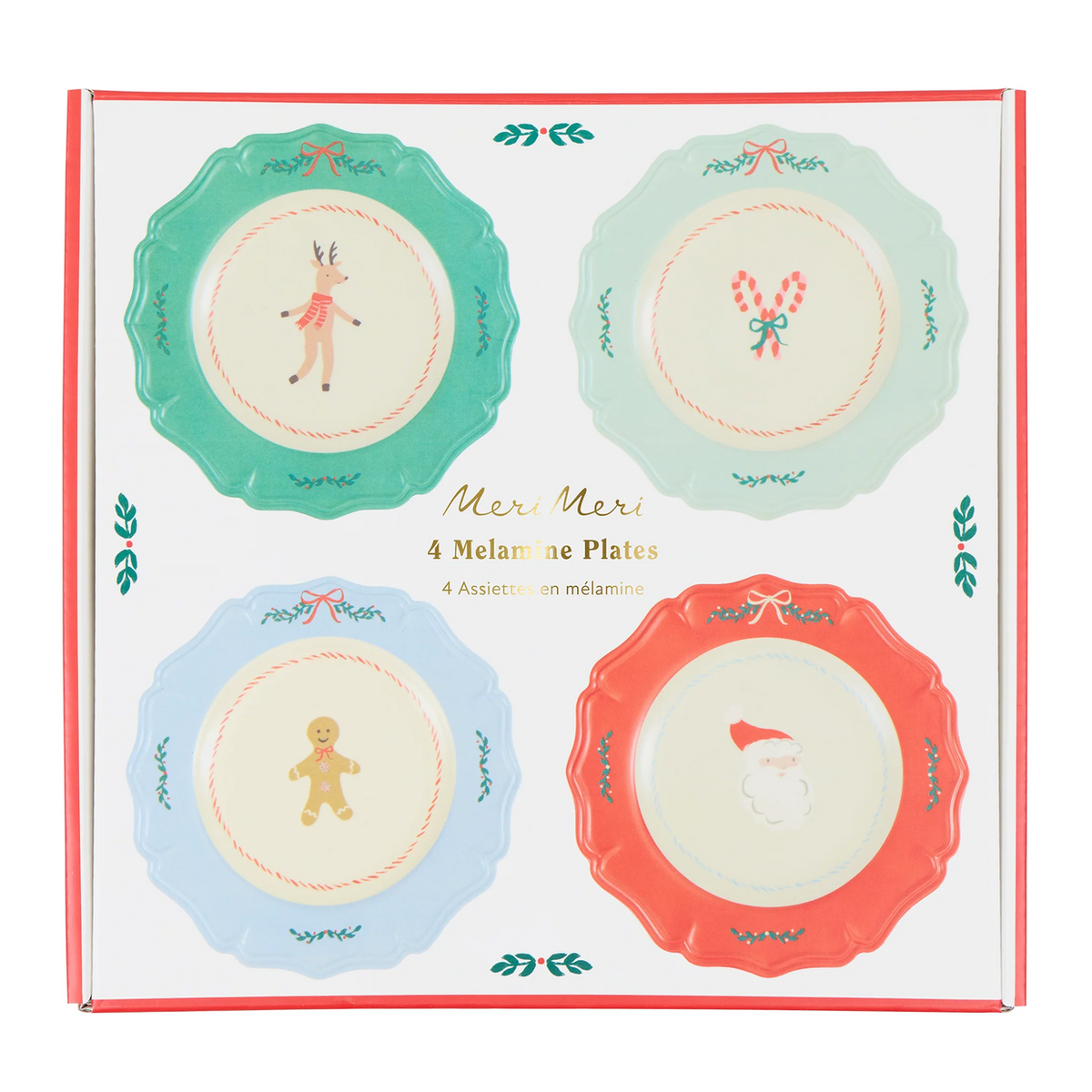 A boxed set of four decorative melamine plates with holiday illustrations, shown in its retail packaging. The set includes plates in teal, pale mint, light blue, and coral red, each with a different festive design such as a reindeer, candy canes, a gingerbread man, and Santa Claus.