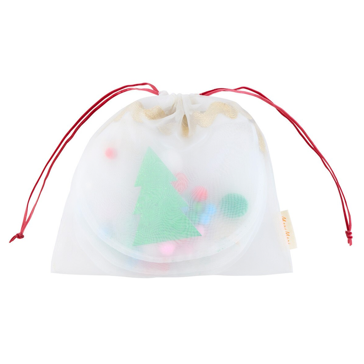 A white mesh drawstring bag with red cords, containing a green Christmas tree-shaped toy and colorful pom-poms, shown on a white background.
