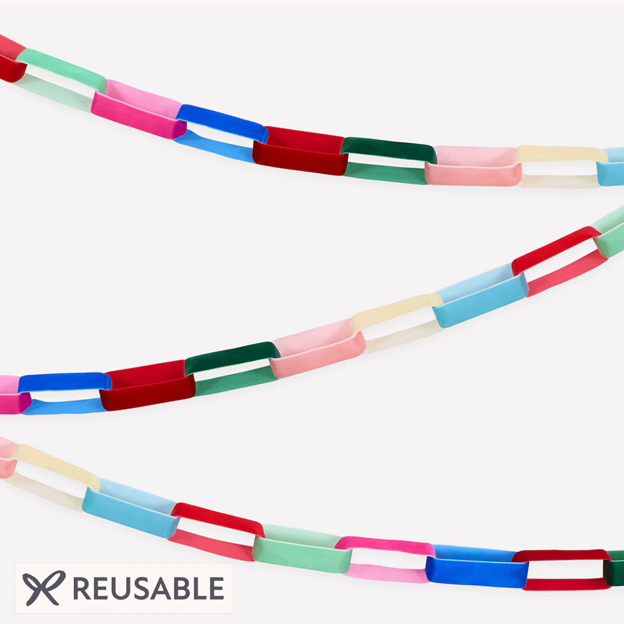 A reusable paper chain garland made of colorful rectangular paper links in pink, blue, red, green, mint, and cream, shown against a white background with a 'REUSABLE' label at the bottom.
