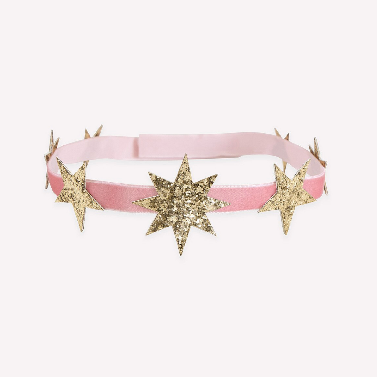 A pink elastic headband decorated with glittery gold star-shaped embellishments, shown against a plain white background.
