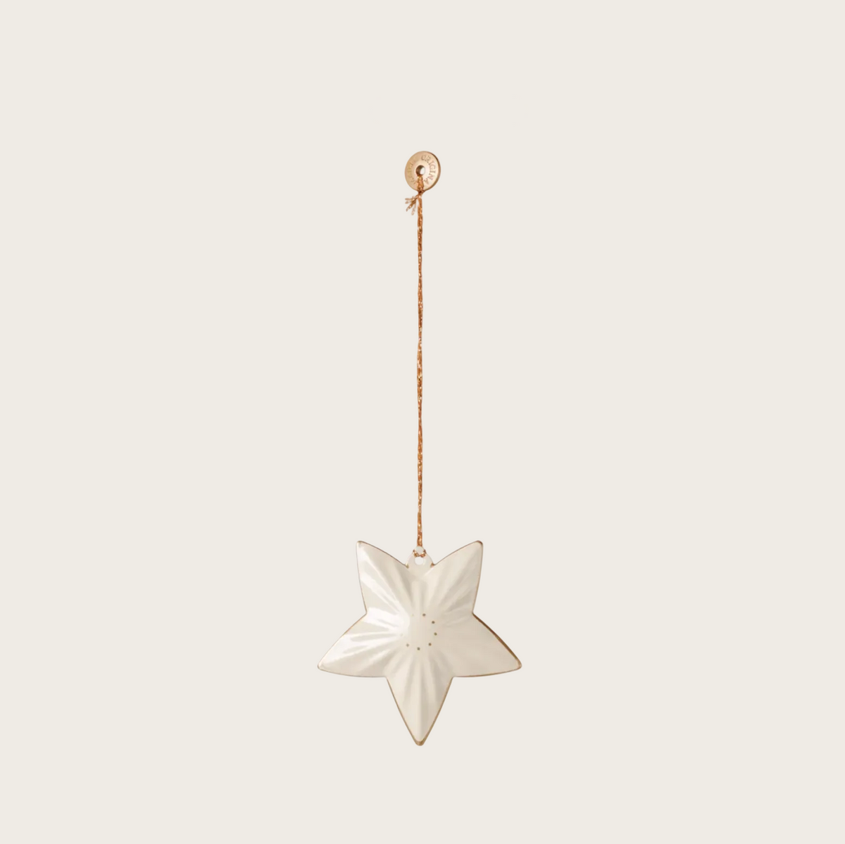 A hanging star-shaped ornament with a textured off-white ceramic body and a thin gold string.