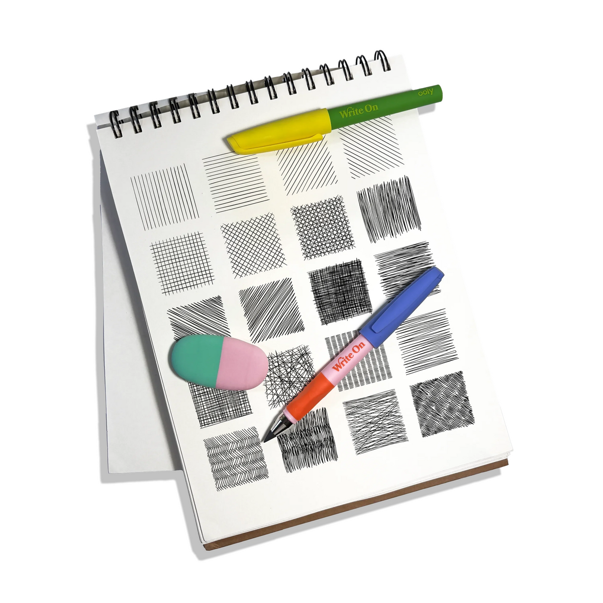Notebook with a pen on a white background