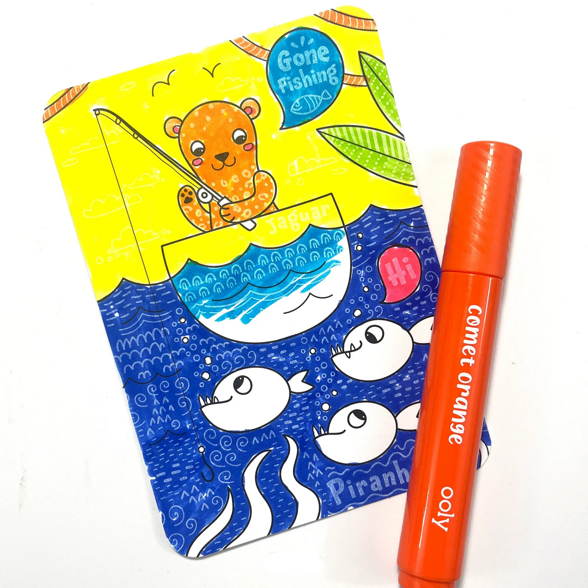 Coloring book with a cartoon bear fishing and an orange marker labeled 'Comet Orange' on a white background.