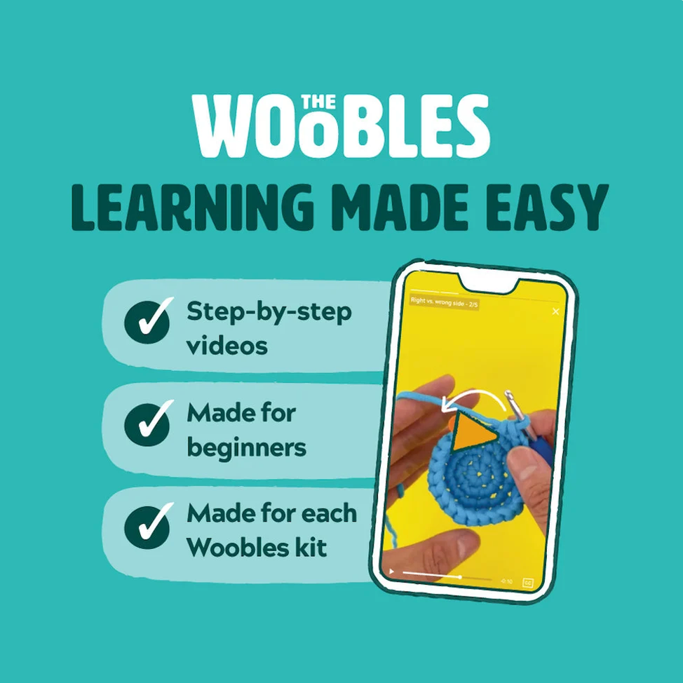 Promotional graphic for 'The Woobles Learning Made Easy' featuring a teal background, white and dark teal text, and a smartphone mockup showing a crocheting tutorial screen. Bullet points on the left highlight step-by-step videos, beginner-friendly design, and compatibility with each Woobles kit.