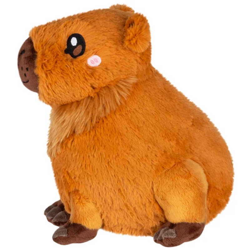Plush toy resembling a groundhog on a white background