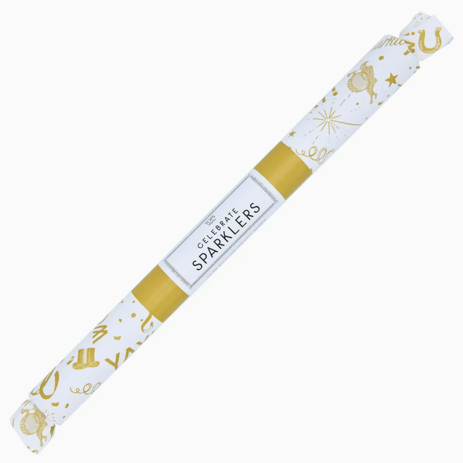 A roll of white party streamers with gold foil-style celebratory graphics and a central white paper band reading 'CELEBRATE SPARKLERS'.