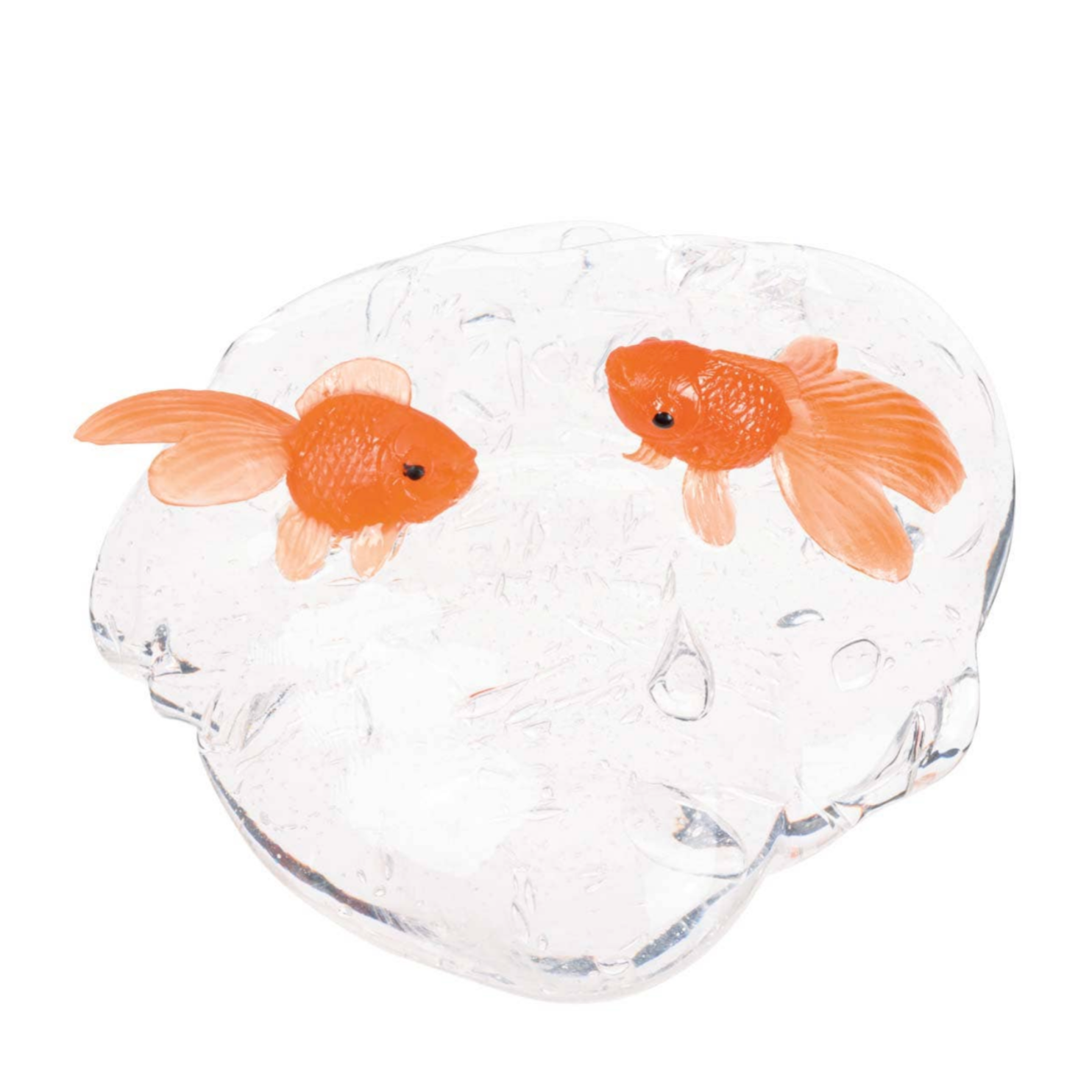 Clear glass slime with two toy goldfish on a white background