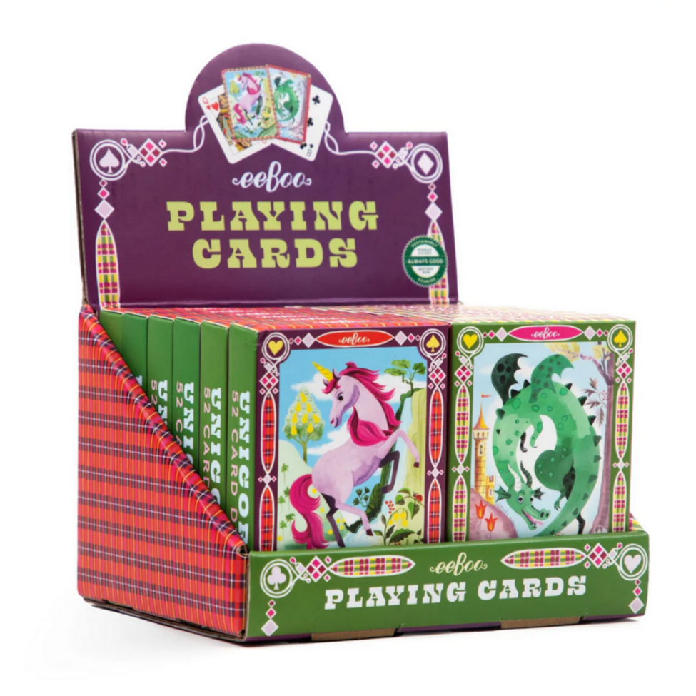 Display of eeflo playing cards with unicorn design on a white background