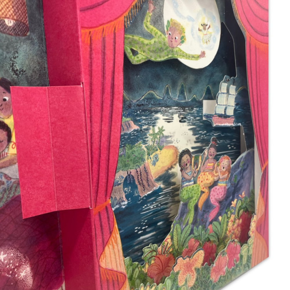 Colorful puppet theater with a scene of a ship and characters on a stage.