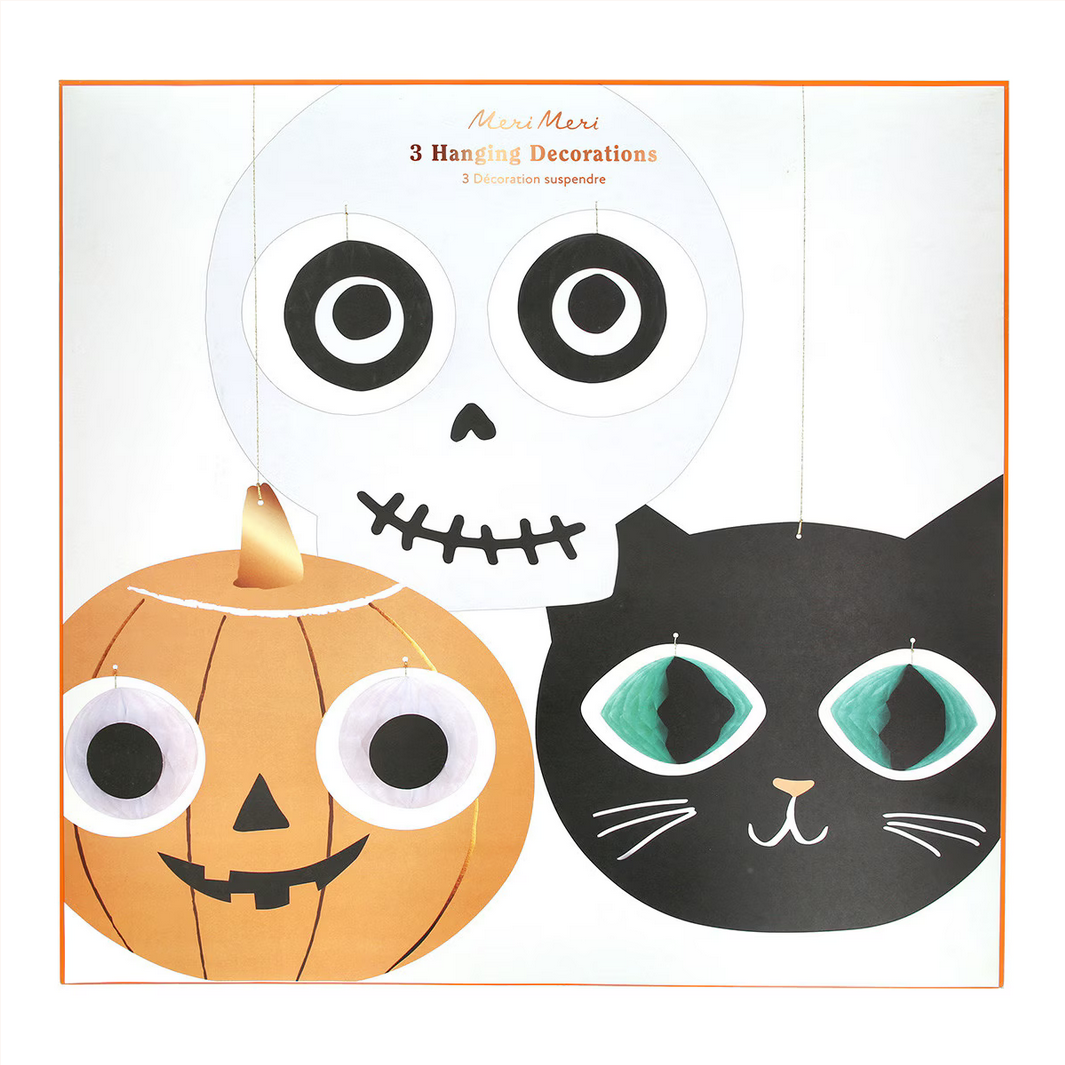 Halloween-themed decorations including a pumpkin, skeleton, and black cat on a white background.