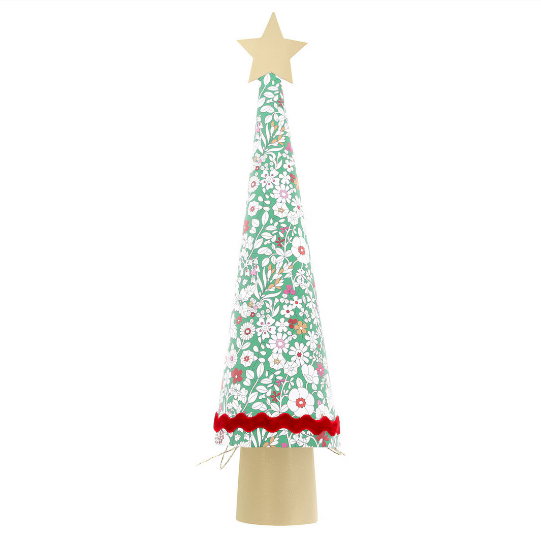 Decorative Christmas tree with floral pattern and star on top against a white background
