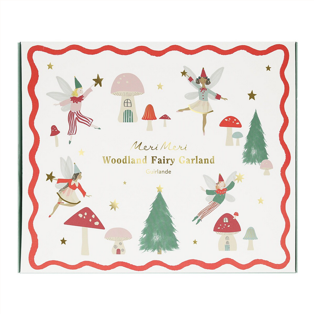Woodland fairy garland packaging with fairies, trees, and mushrooms on a white background.