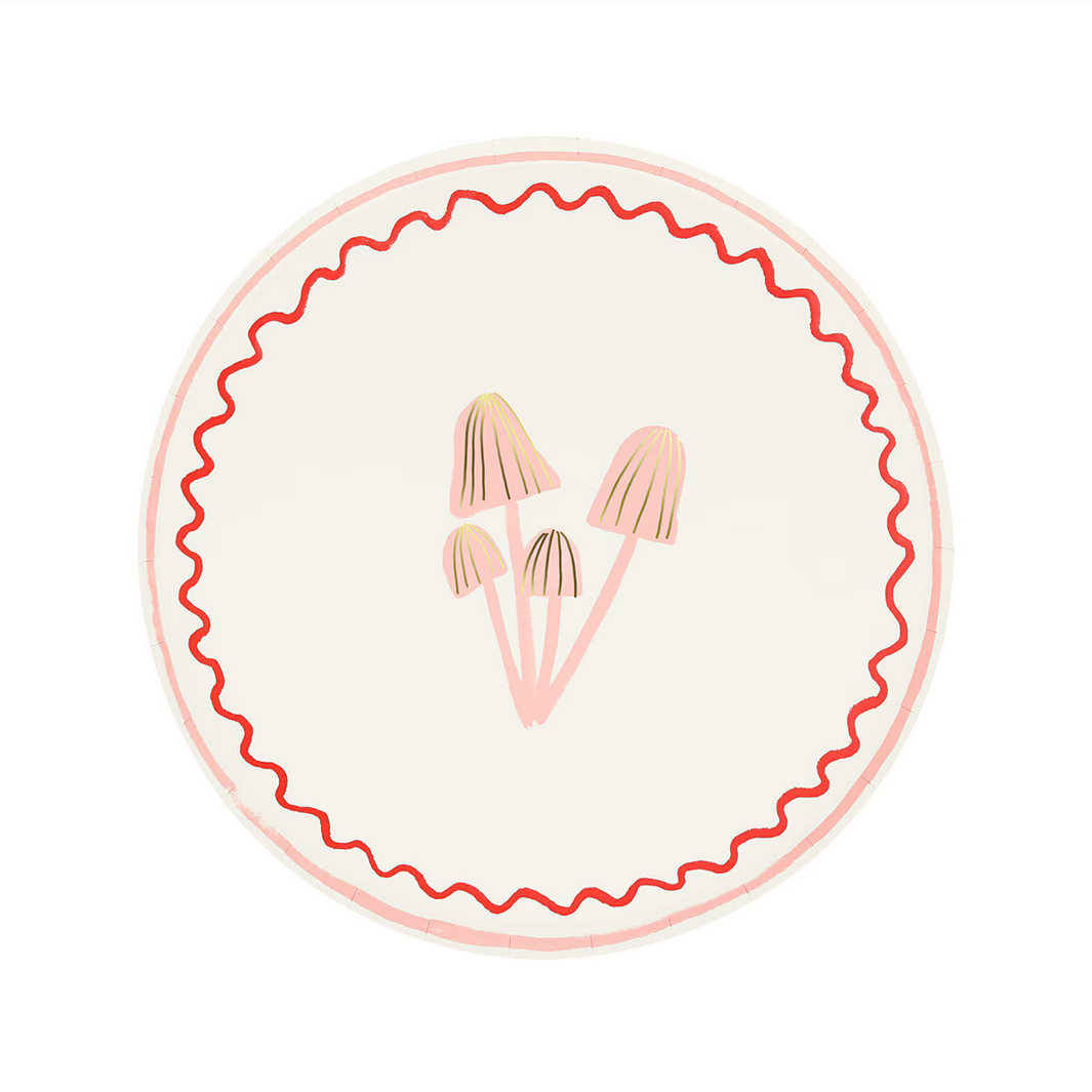 Round plate with red decorative rim and pink floral design on a white background