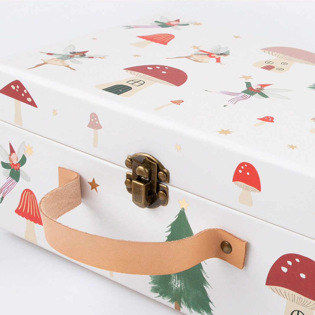 Wooden box with fairy tale design featuring mushrooms, houses, and fairies on a white background.