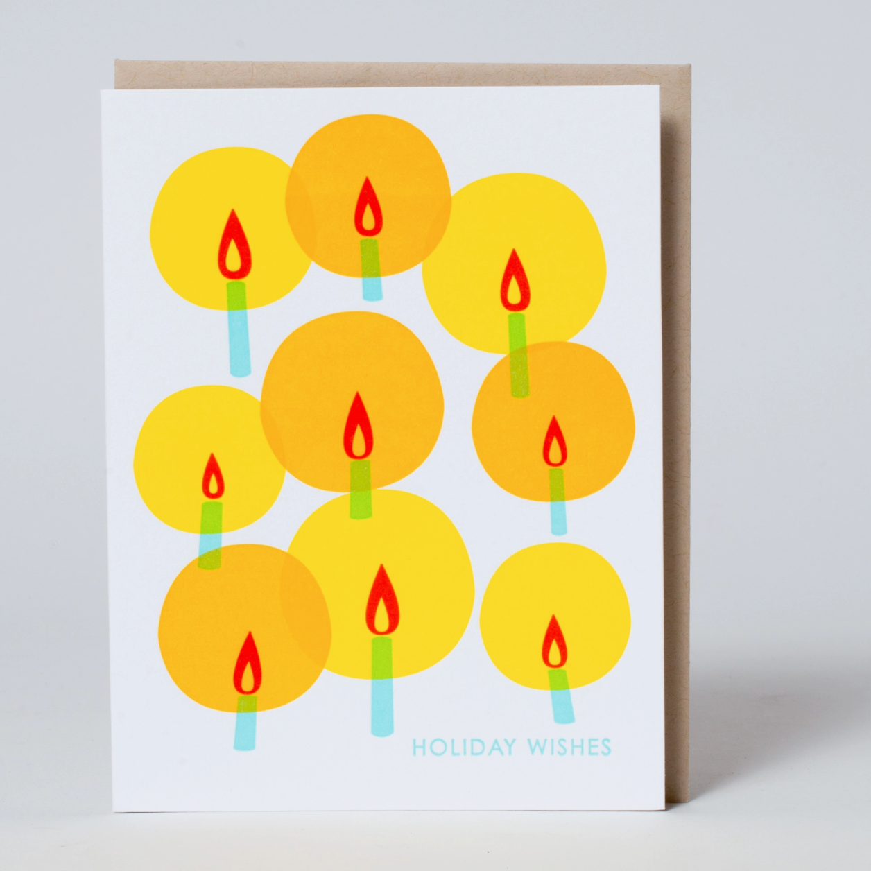 Greeting card with yellow candles and 'Holiday Wishes' text on a white background