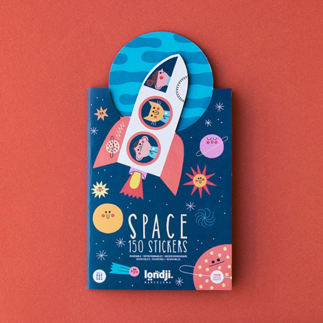 Pack of stickers with a space theme on a red background