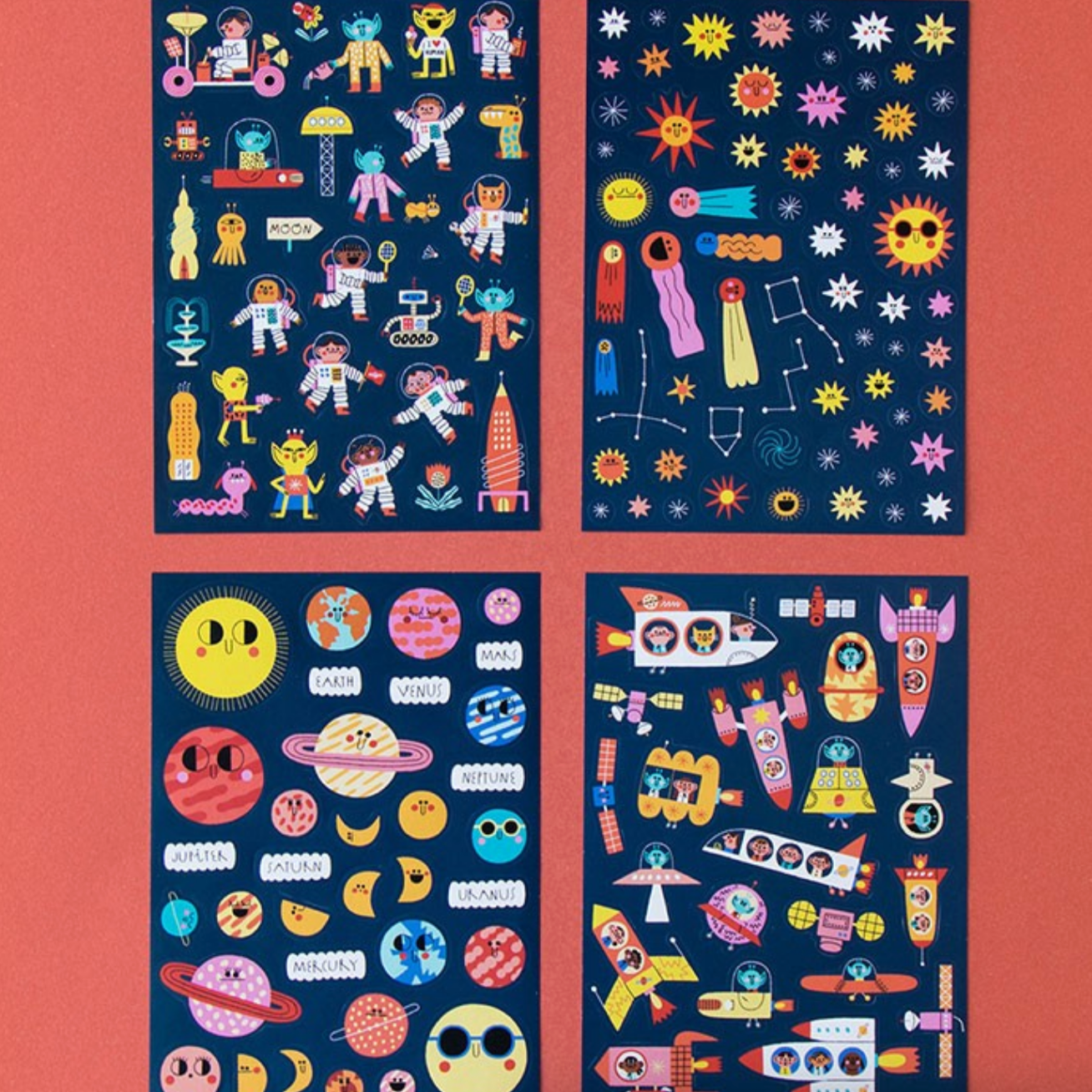 Four colorful posters with space-themed designs on a red background
