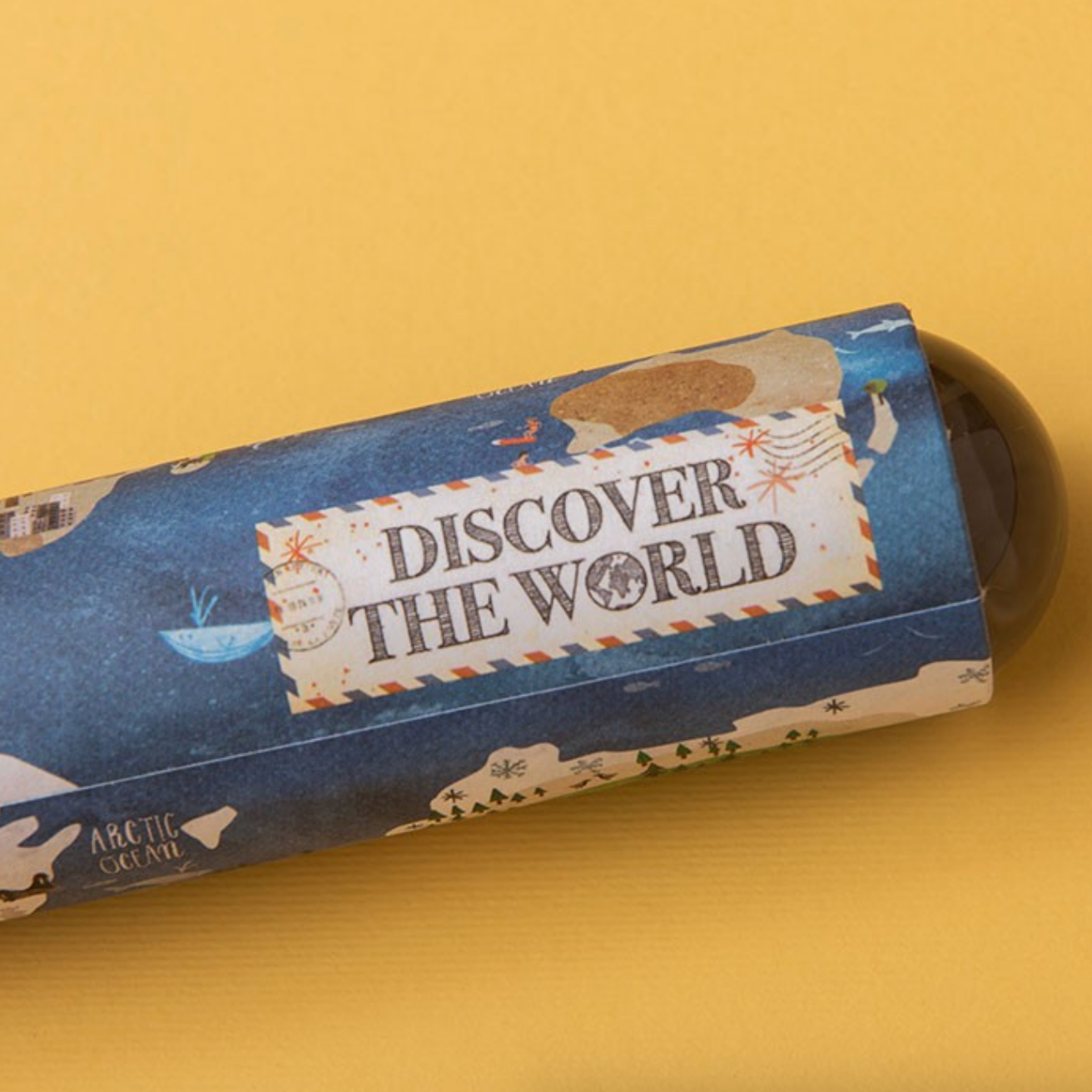  cylindrical kaleidoscope with 'Discover the World' text on a yellow background