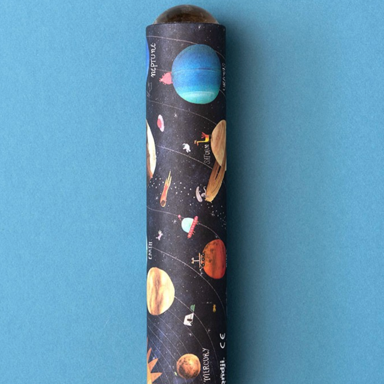 kaleidoscope with solar system design on a blue background