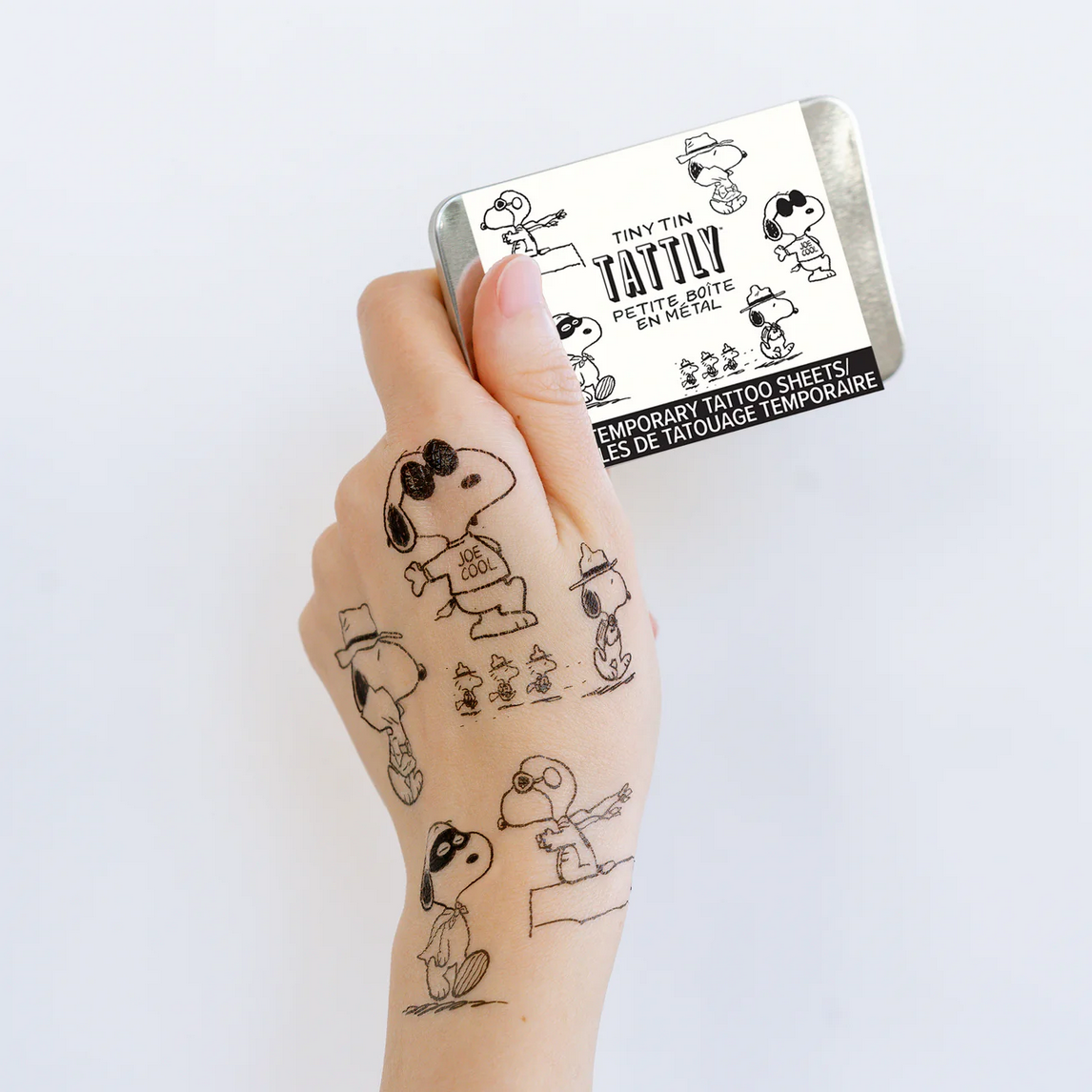 Many Faces of Snoopy Tattoo Tin