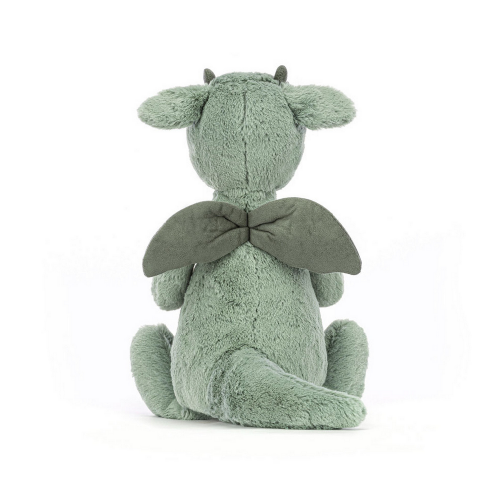 Plush dragon toy labeled 'Bashful Dragon' on a white background