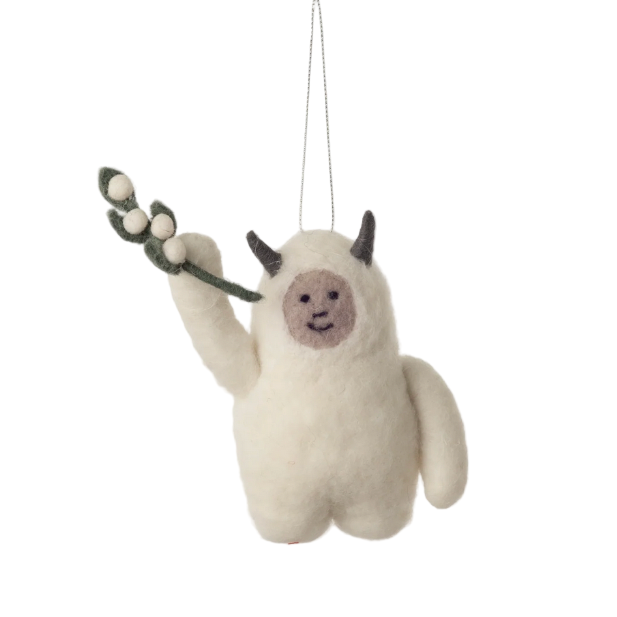 White plush toy with black horns and a branch, hanging against a white background