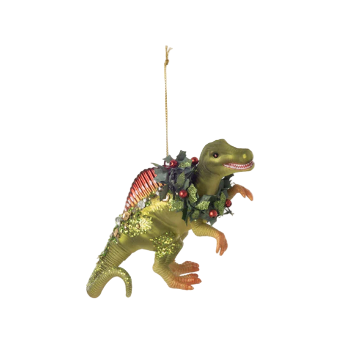 Decorative dinosaur ornament with a wreath on a white background