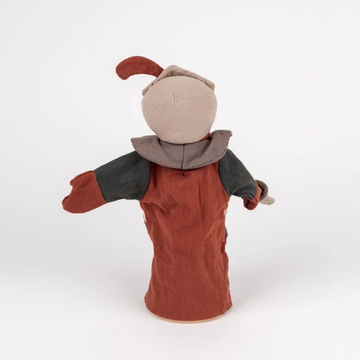 Hand puppet with a neutral face and brown outfit on a white background