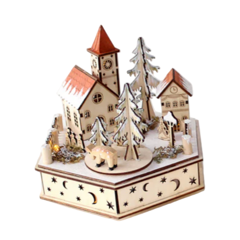 Small decorative model of a village with buildings and trees on a white background
