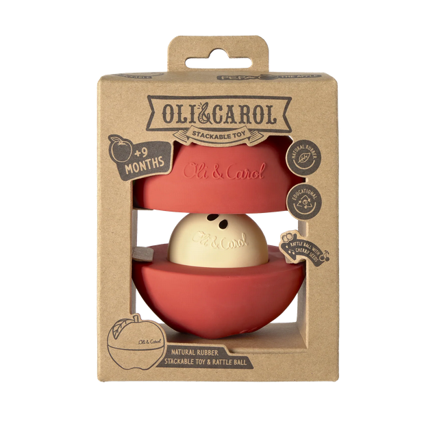 Oli & Carol stackable toy and rattle ball packaging on a white background