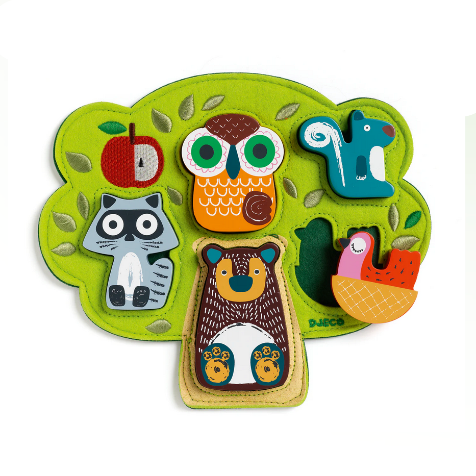 Children's educational puzzle with animal figures on a green base
